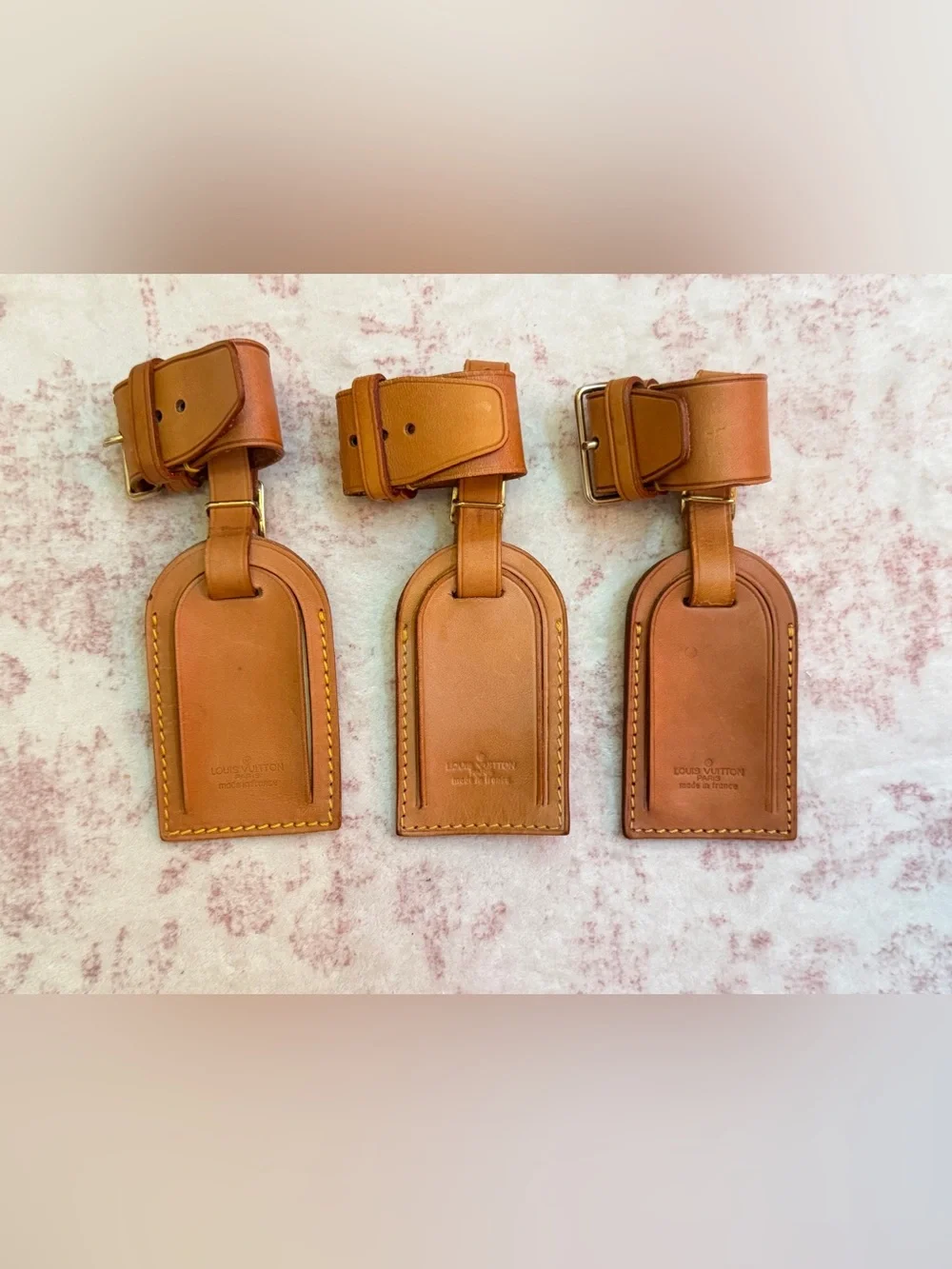 Set of 3 authentic Louis Vuitton Luggage Tags and Poignets